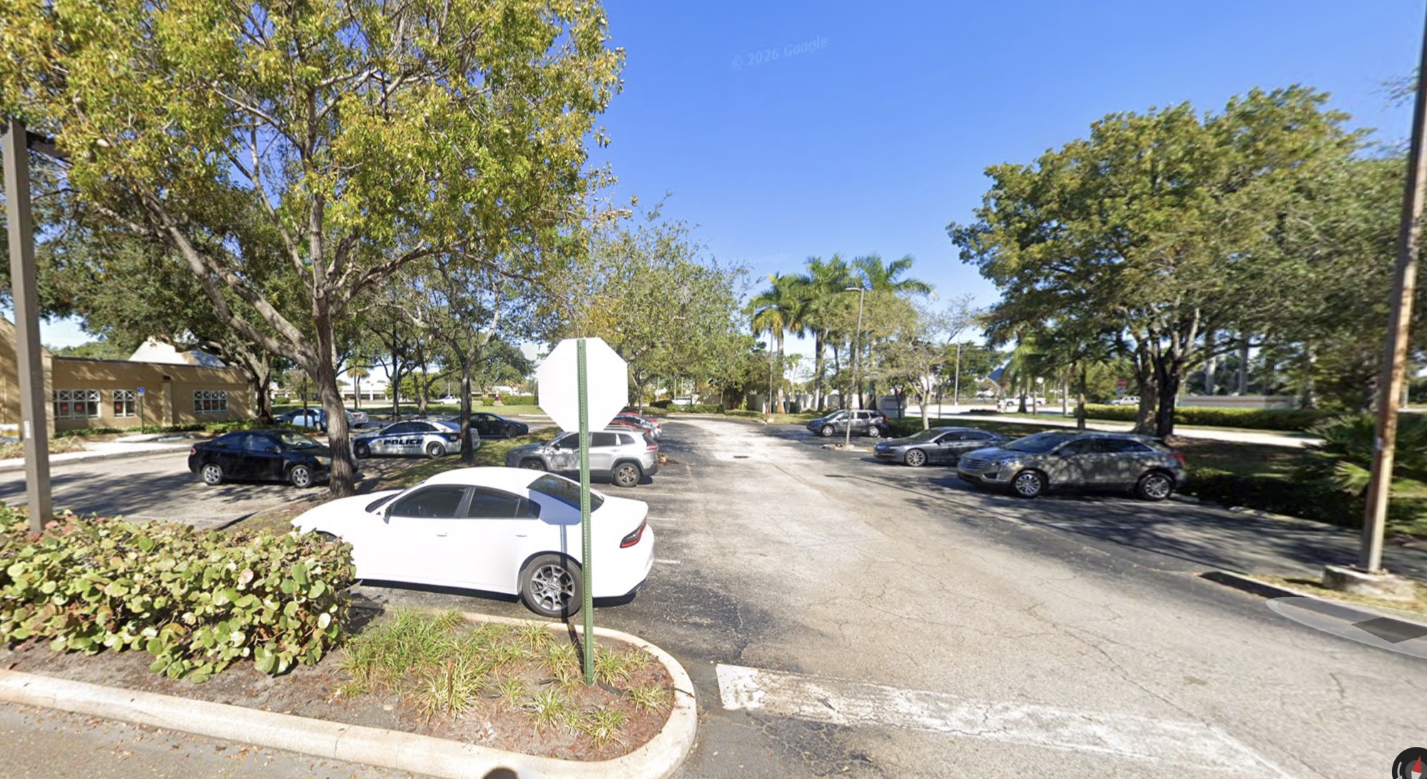Park 201 parking lot at 1700 W. Commercial Blvd, Fort Lauderdale FL — exterior view